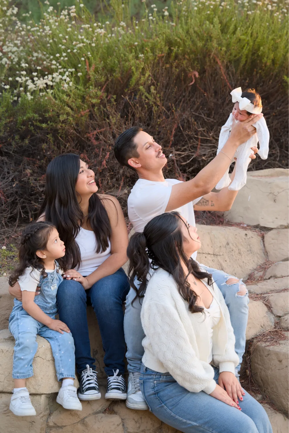 Tony and Valerie with their family at golden hour